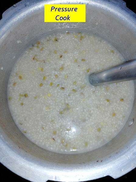 Pressure Cook millet and dal for 3 whistles.