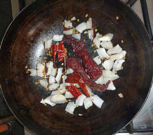 Dry roast coconut, chili, methi seeds.