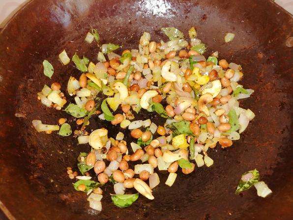 Add in Chopped Onion, Curry Leaves, Turmeric Powder.