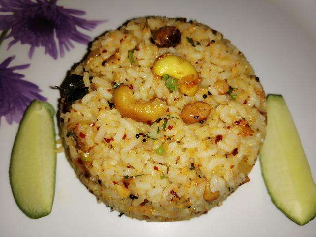 Now the Spicy Raw Mango Rice is ready to serve.