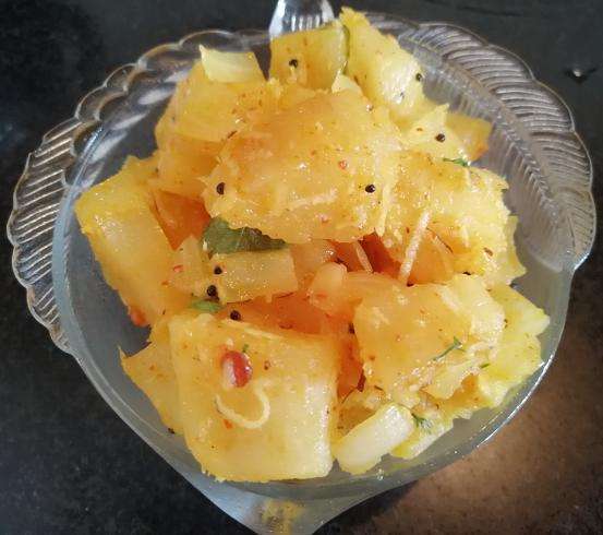 Delish Tapioca Side dish/palya is ready to serve with rice.