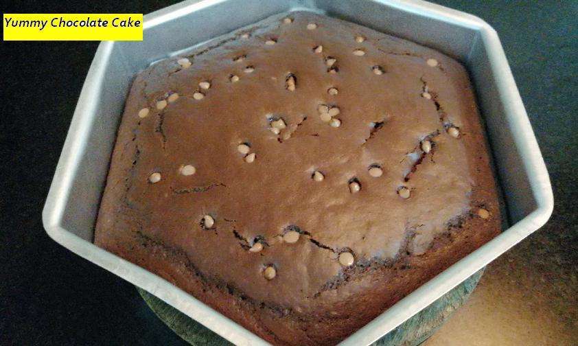 Remove the cake from the oven and let it cool. Take a toothpick or fork put in the center of the cake, if it comes out clean without wet then the cake is fully baked. 