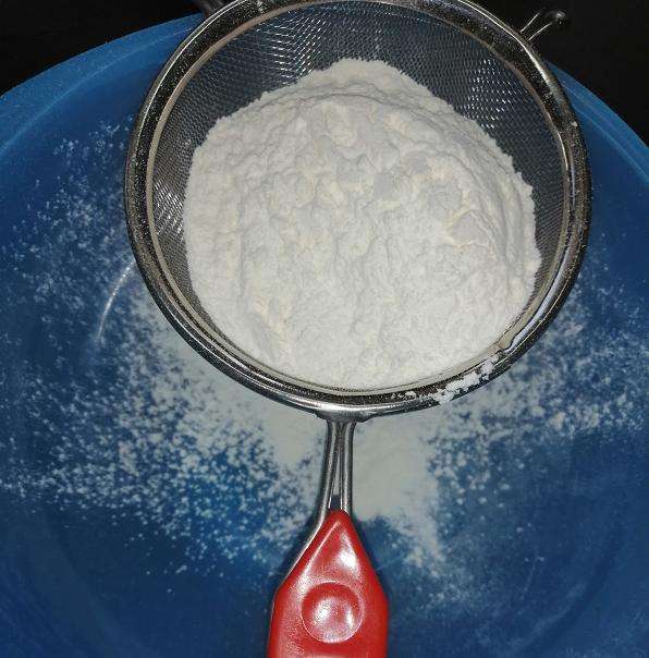 Take a bowl and add in all the dry ingredients, flour, baking soda, baking powder, salt, sugar and cocoa powder. Give a mix.