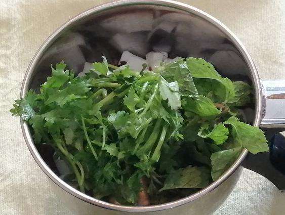 Add in fresh coriander leaves.