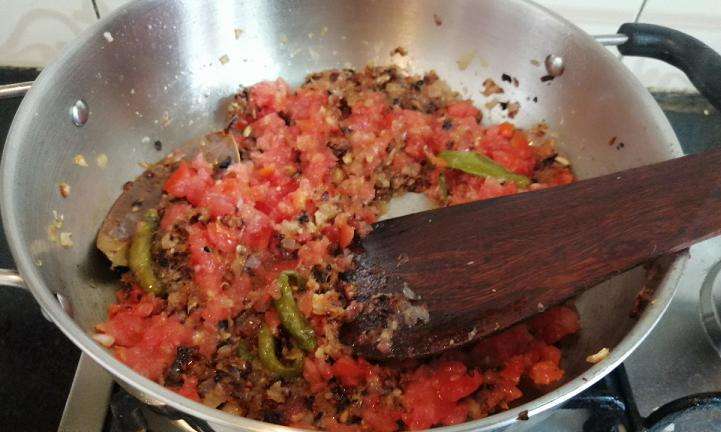Add in chopped tomatoes and cook for 3 minutes in low flame.