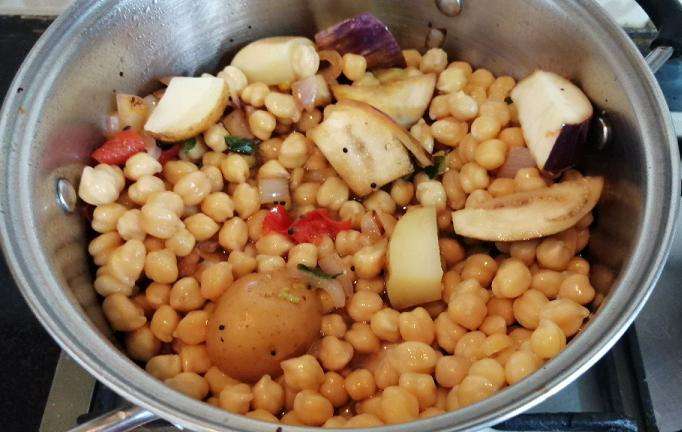 Add in cooked Kabuli Channa.