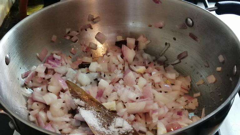 Add in the chopped onions and little salt. Cook till the onions turns golden color.