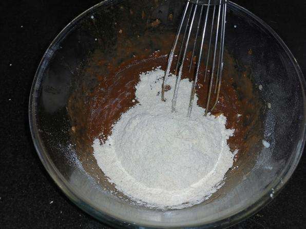 Add in wheat flour and give a mix without lumps.