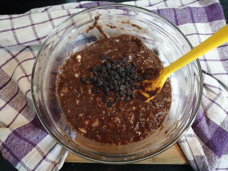 Add in chocolate chips and white chips and give a mix.