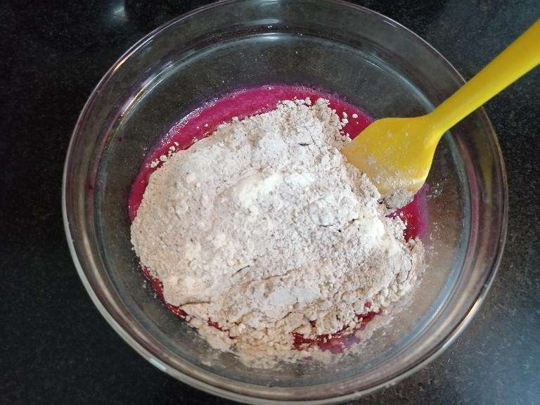 Add in all purpose flour, cocoa powder, sugar, baking soda, baking powder, pinch of salt. Give a gentle mix.