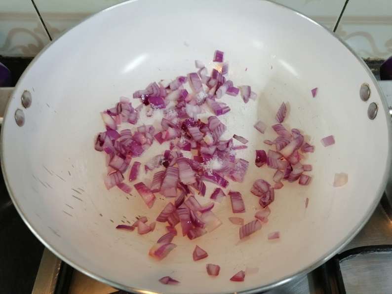 Heat a pan and add in oil, chopped onions and salt to taste.