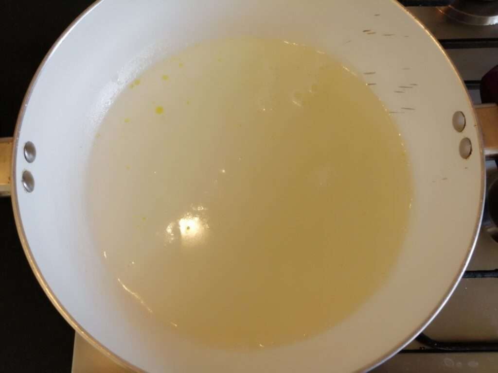 Heat a pan and add in thick milk and allow it boil till it reduces to half.